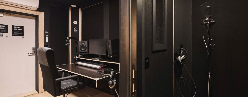 recording studio with vocal recording booth audio monitoring desk | © Plug The Jack